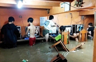 Mặc kệ lũ lụt ngập cả mét, quán net Philippines vẫn chật kín game thủ rủ nhau đến 